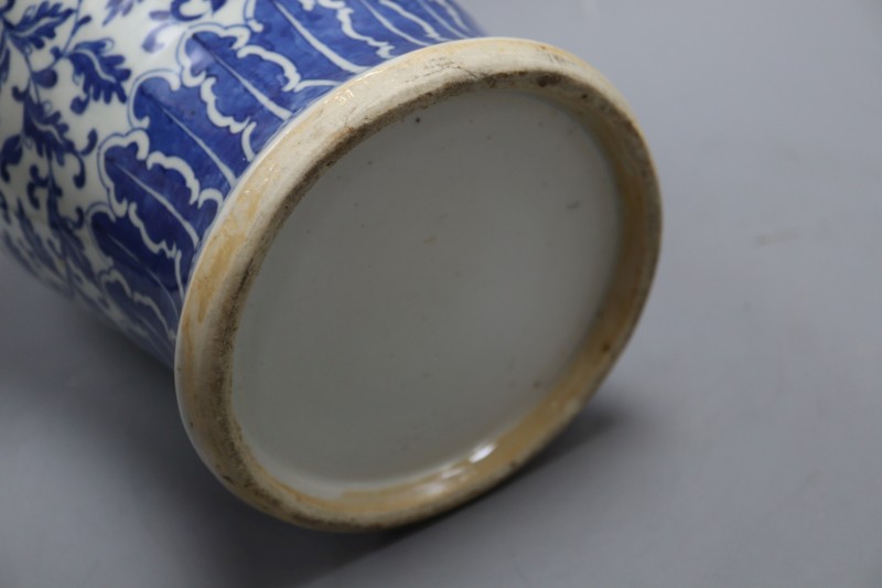 A Chinese blue and white vase, height 39cm (damaged)